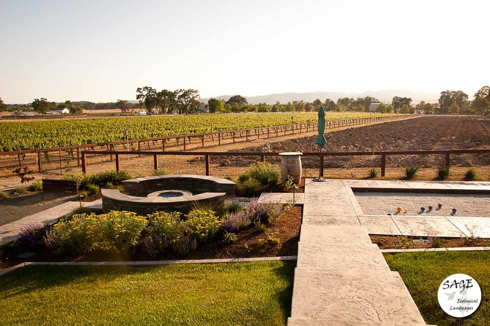 Design ideas for a large mediterranean back full sun garden in San Luis Obispo with an outdoor sport court and concrete paving.