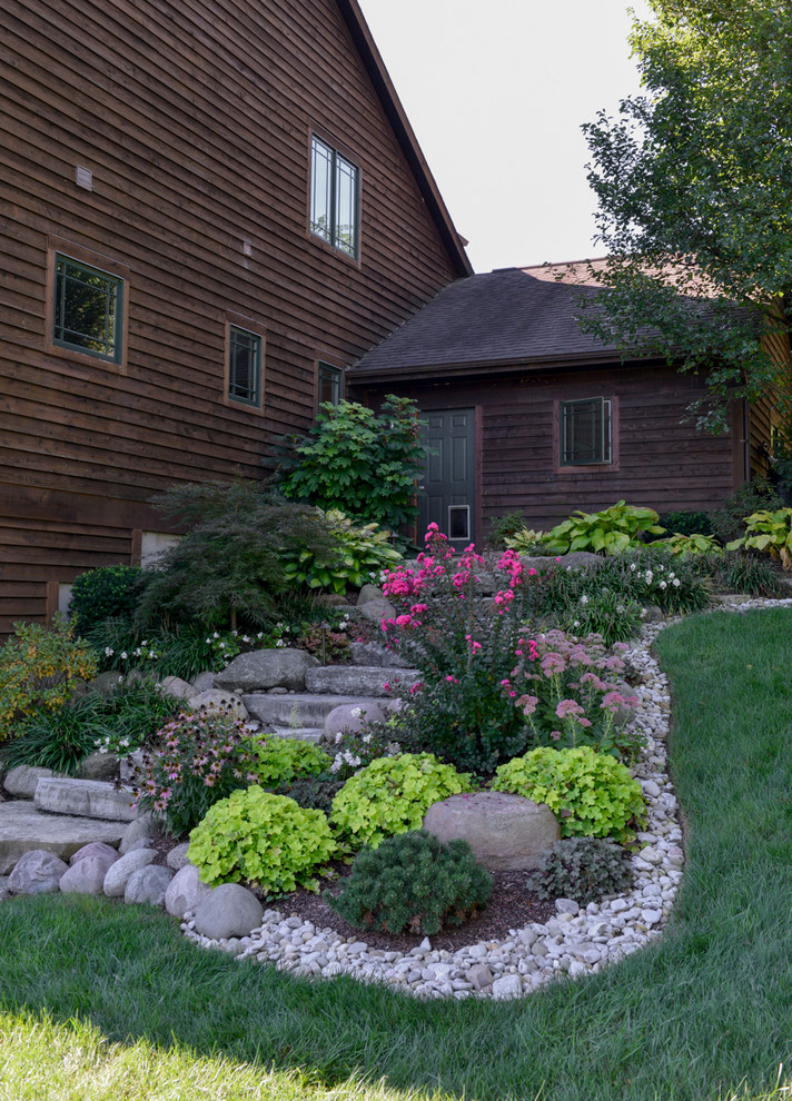 This is an example of an eclectic backyard landscaping in Cincinnati.