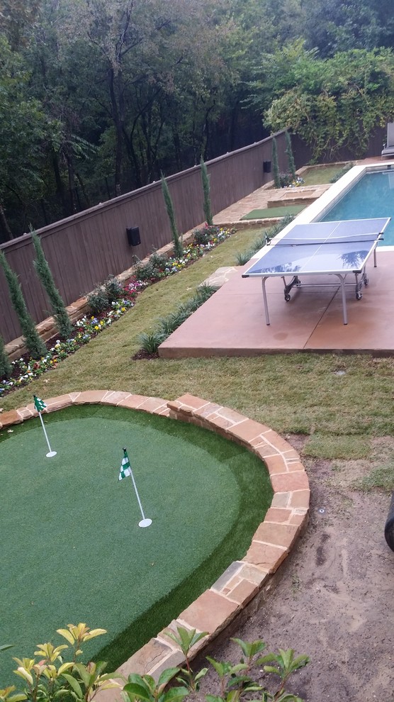 Design ideas for a medium sized modern back full sun garden in Dallas with an outdoor sport court.