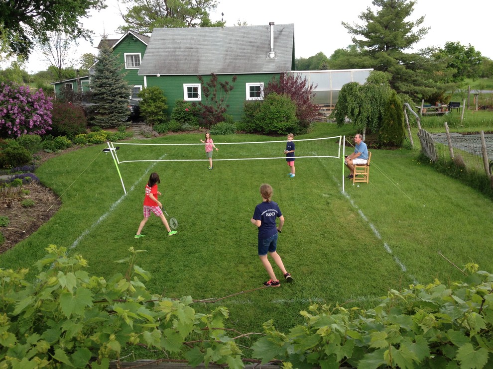Inspiration for a small farmhouse full sun backyard outdoor sport court in Burlington for summer.