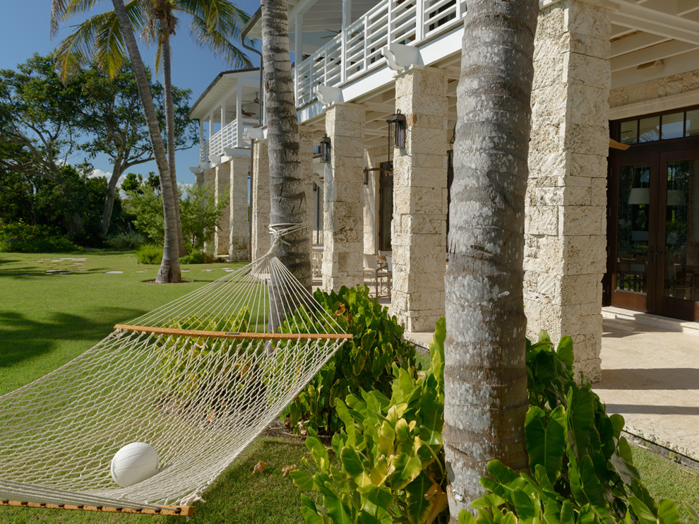 Design ideas for a world-inspired back garden in Miami.