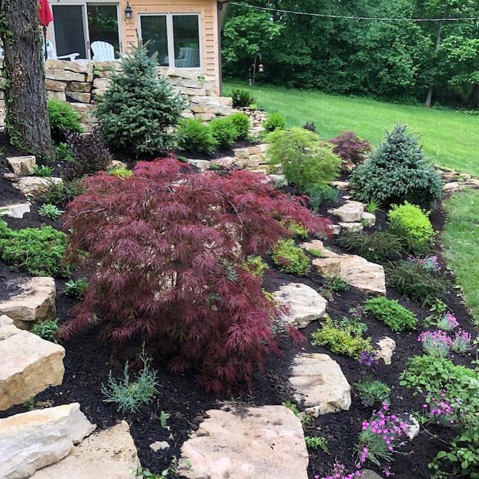 Inspiration for a rustic garden for summer in Chicago with natural stone paving.