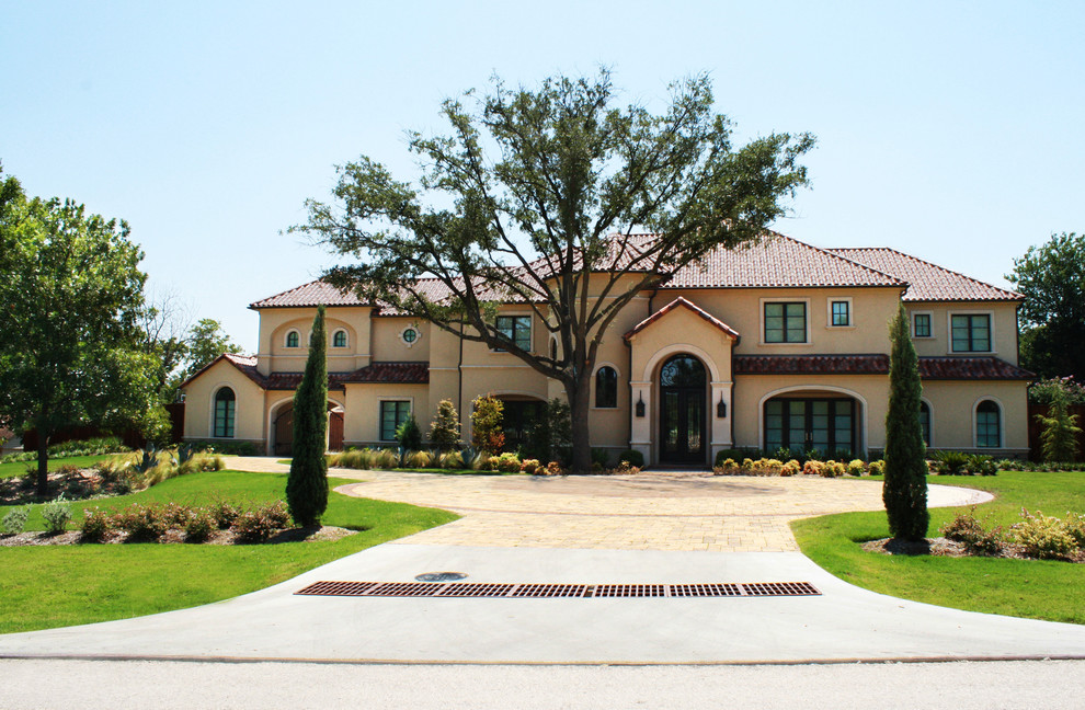 Design ideas for a medium sized mediterranean side driveway fully shaded garden in Dallas with natural stone paving.