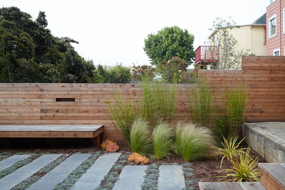 Design ideas for a mid-sized contemporary full sun backyard concrete paver landscaping in San Francisco.