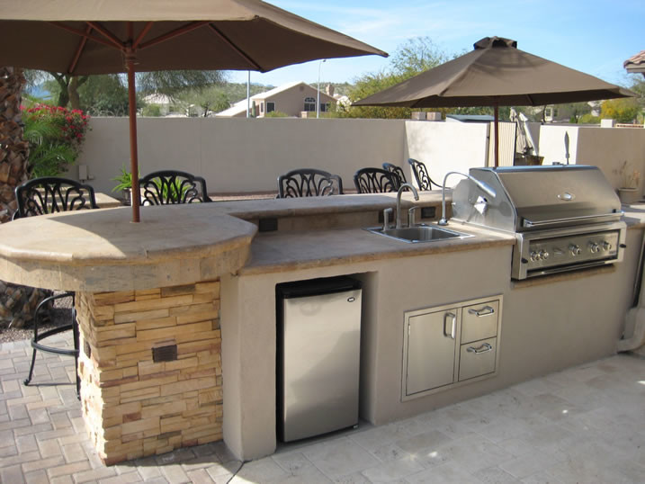 Inspiration for a classic back patio in Phoenix with concrete paving.
