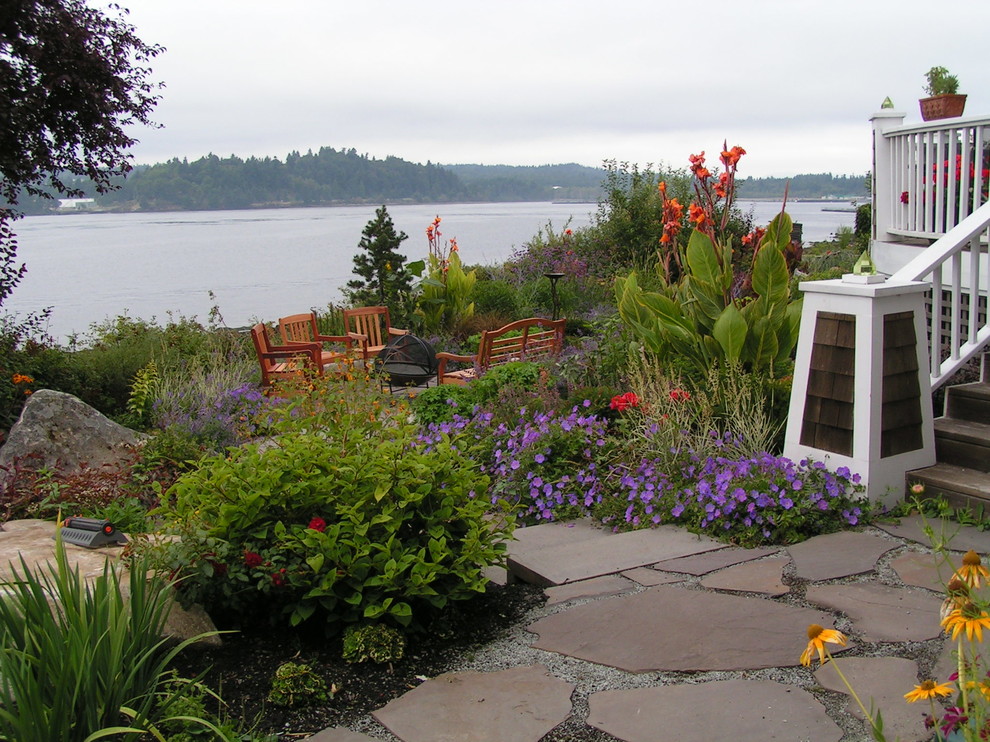 This is an example of a nautical garden seating in Seattle with a fire feature.
