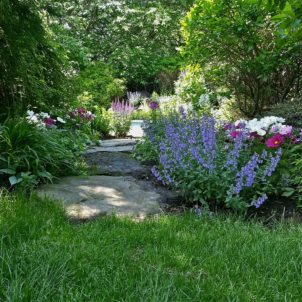 Inspiration for a mid-sized coastal partial sun backyard stone garden path in New York for summer.