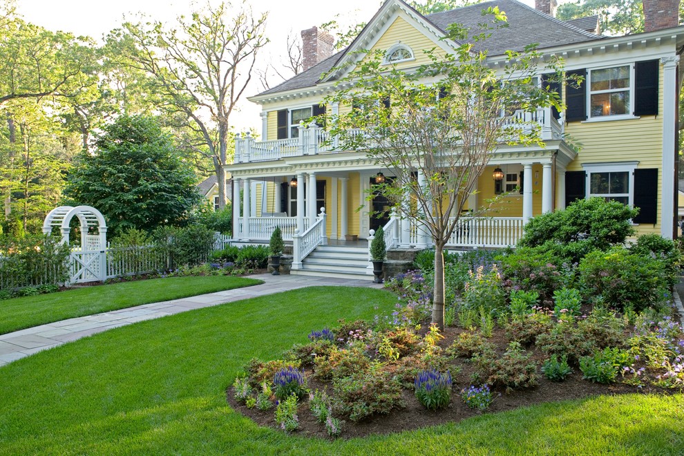 This is an example of a traditional front yard landscaping in New York.