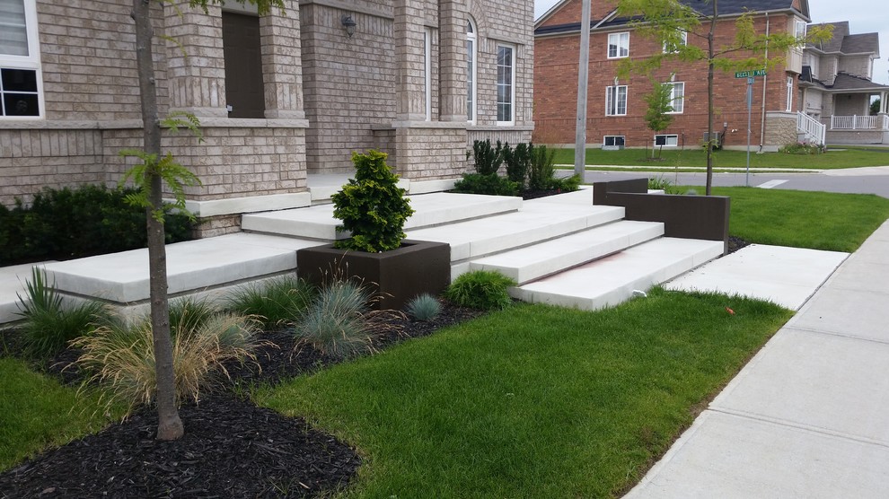 This is an example of a contemporary front yard landscaping in Toronto.