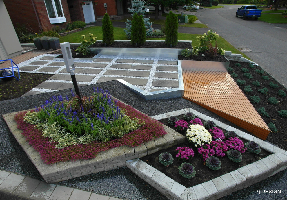Inspiration pour un jardin en pots avant minimaliste de taille moyenne et l'été avec une exposition ensoleillée et des pavés en béton.