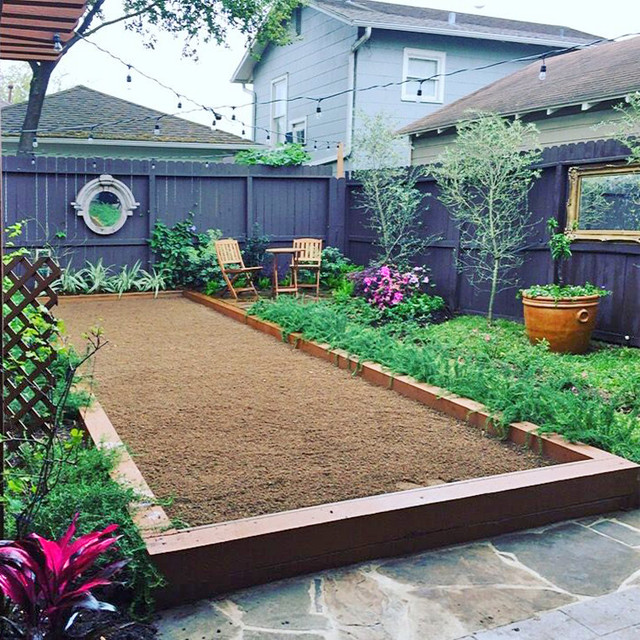 Bocce ball and food in Montrose Traditional Garden Houston by