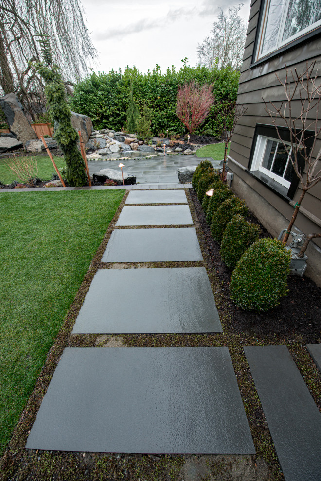 Bocce Ball Court, Pond, Granite Rocks and Dimensonal Flagstone Garden