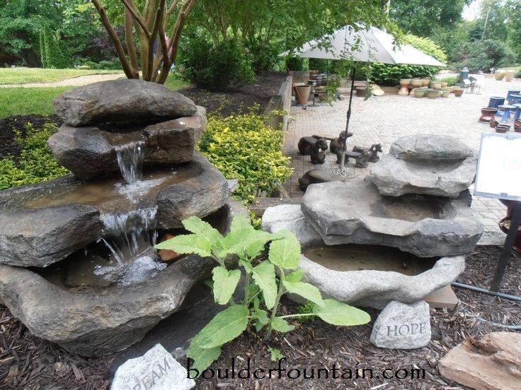 Idées déco pour un jardin montagne avec un point d'eau et des pavés en brique.