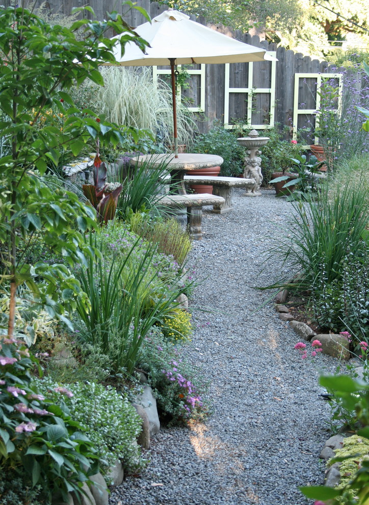 Inspiration for a large craftsman shade backyard gravel landscaping in San Francisco.