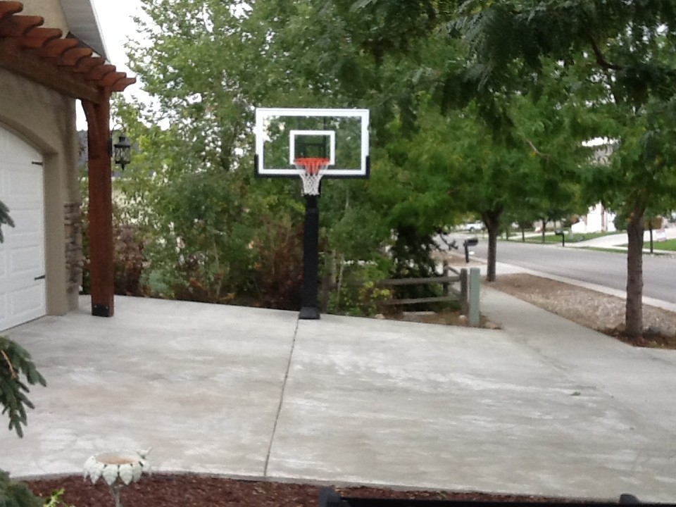 Inspiration for a large traditional partial sun front yard outdoor sport court in Salt Lake City.