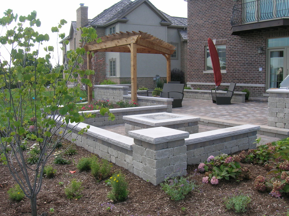Brick Patio, Seat Wall and Pergola Transitional Landscape Chicago