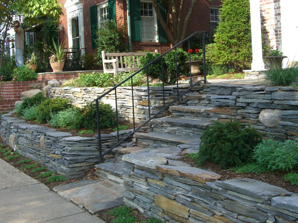 Brick townhouse front landscape renovation 2012 - Transitional