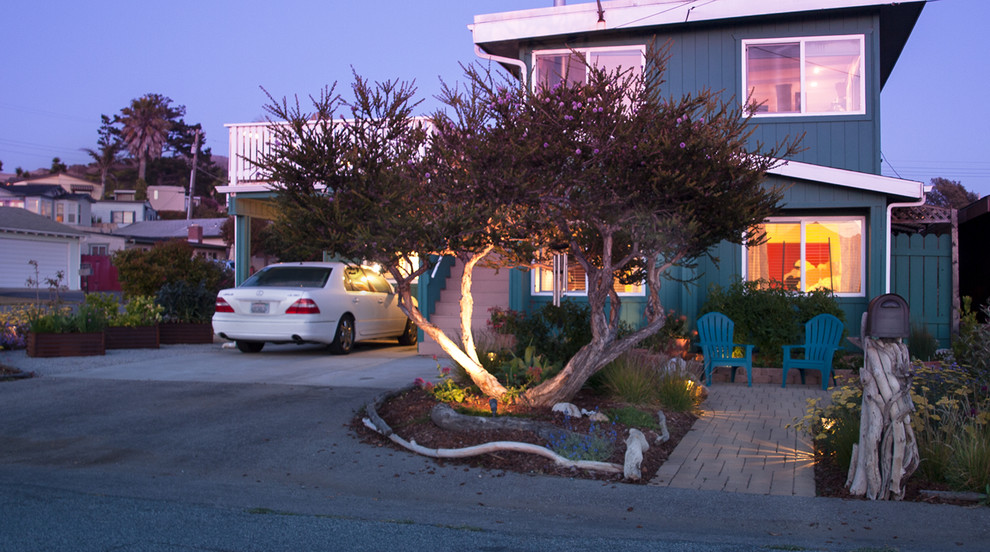 Inspiration for a small coastal drought-tolerant and full sun front yard concrete paver garden path in Other.