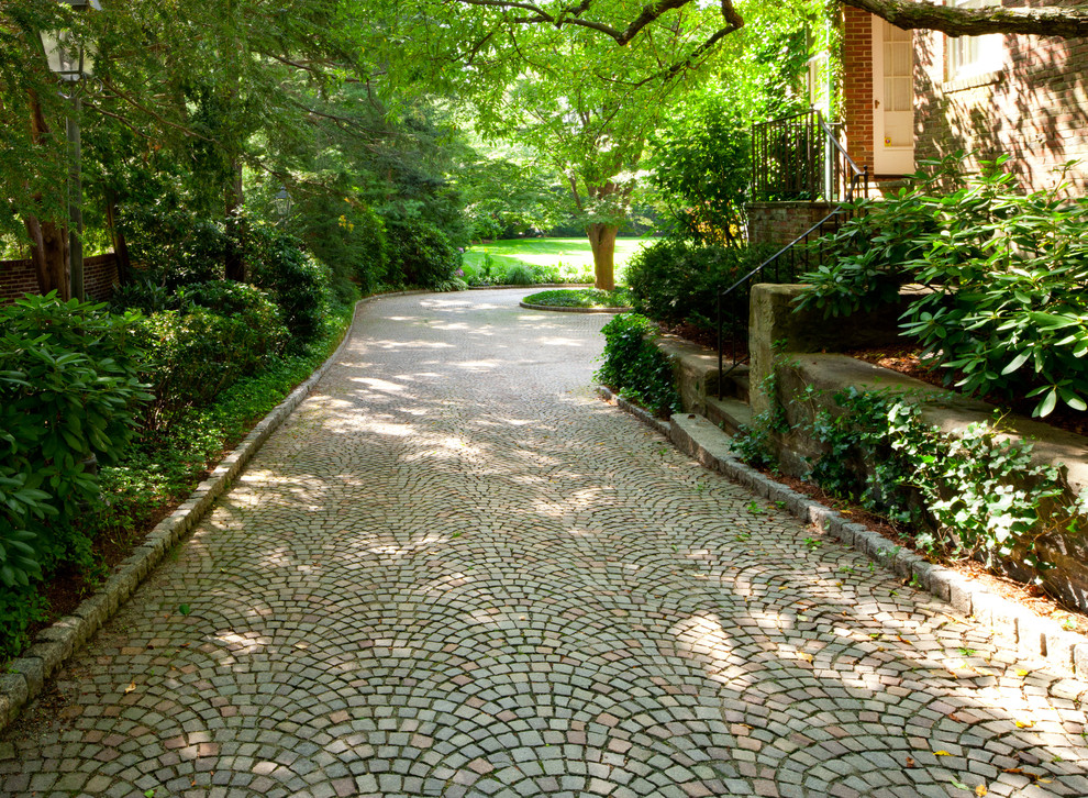 Design ideas for a large traditional partial sun side yard concrete paver garden path in Boston.
