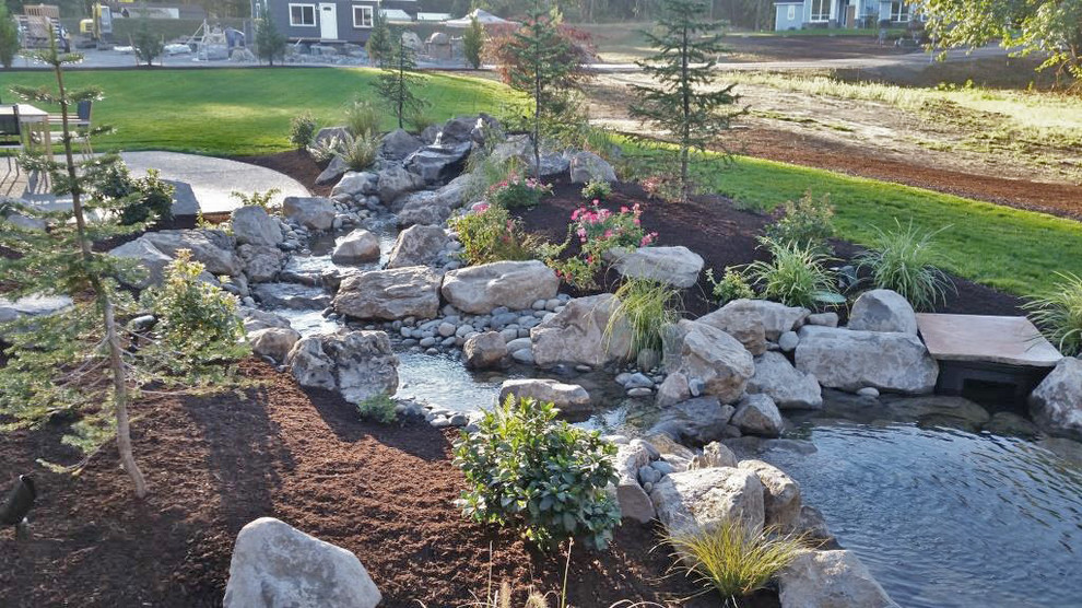 This is an example of a large backyard water fountain landscape in Portland.