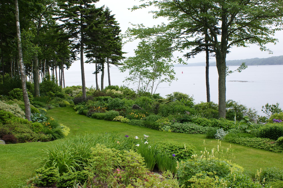 Photo of a coastal backyard landscaping in Portland Maine.