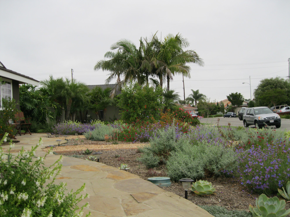Design ideas for a mid-sized mediterranean landscaping in Orange County.
