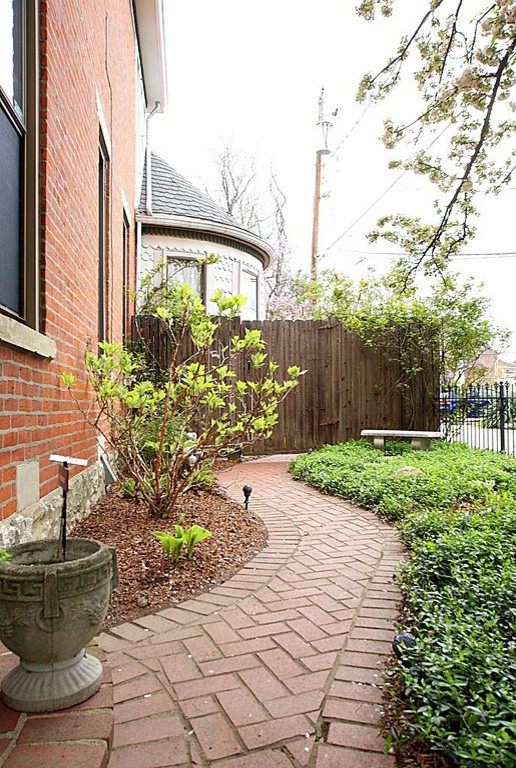 This is an example of a traditional shade front yard brick garden path in Columbus for spring.