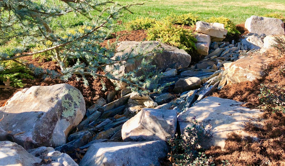 This is an example of a large asian full sun front yard stone garden path in Charlotte.