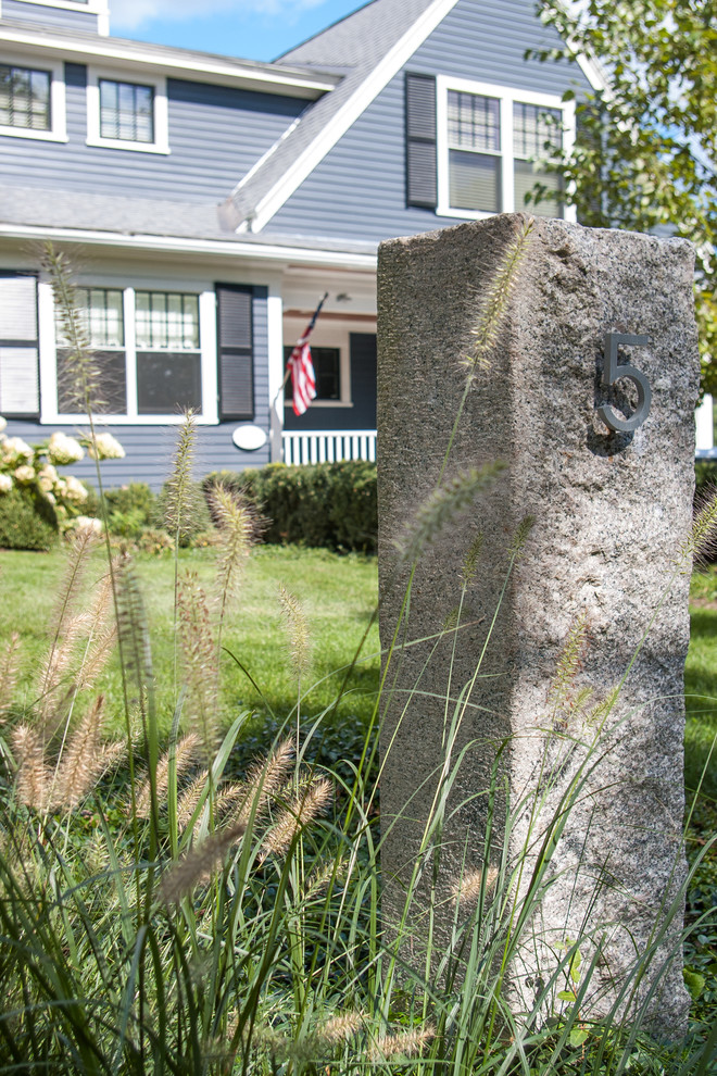Inspiration for a small contemporary partial sun front yard stone garden path in Boston.