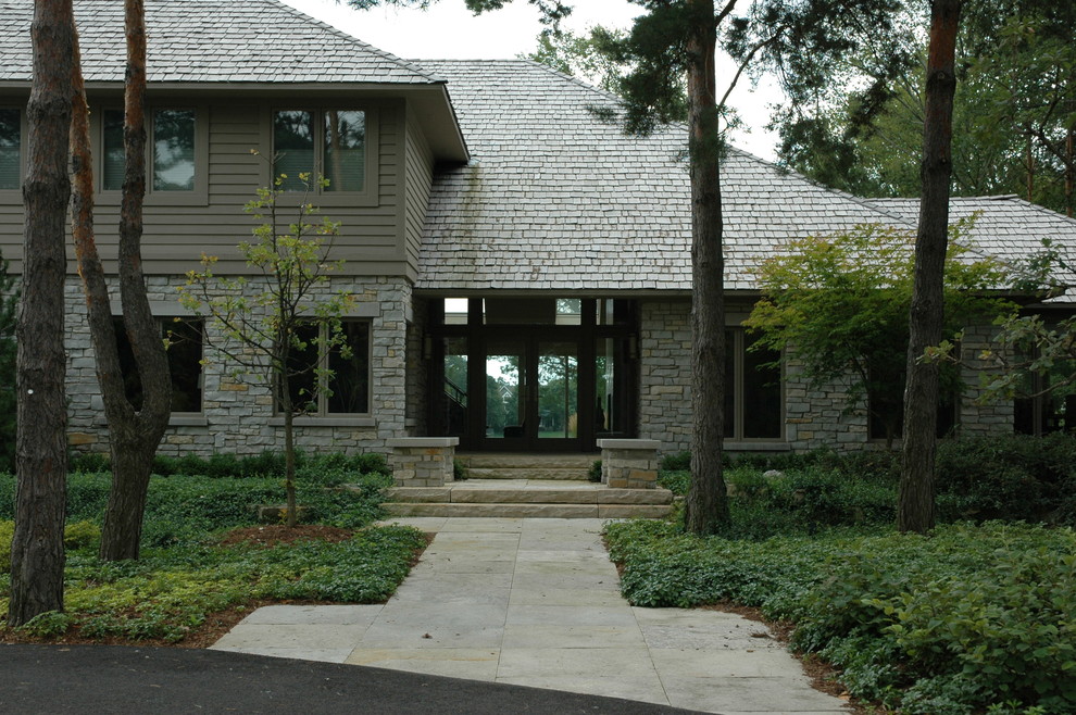 Immagine di un giardino minimal davanti casa con pavimentazioni in pietra naturale