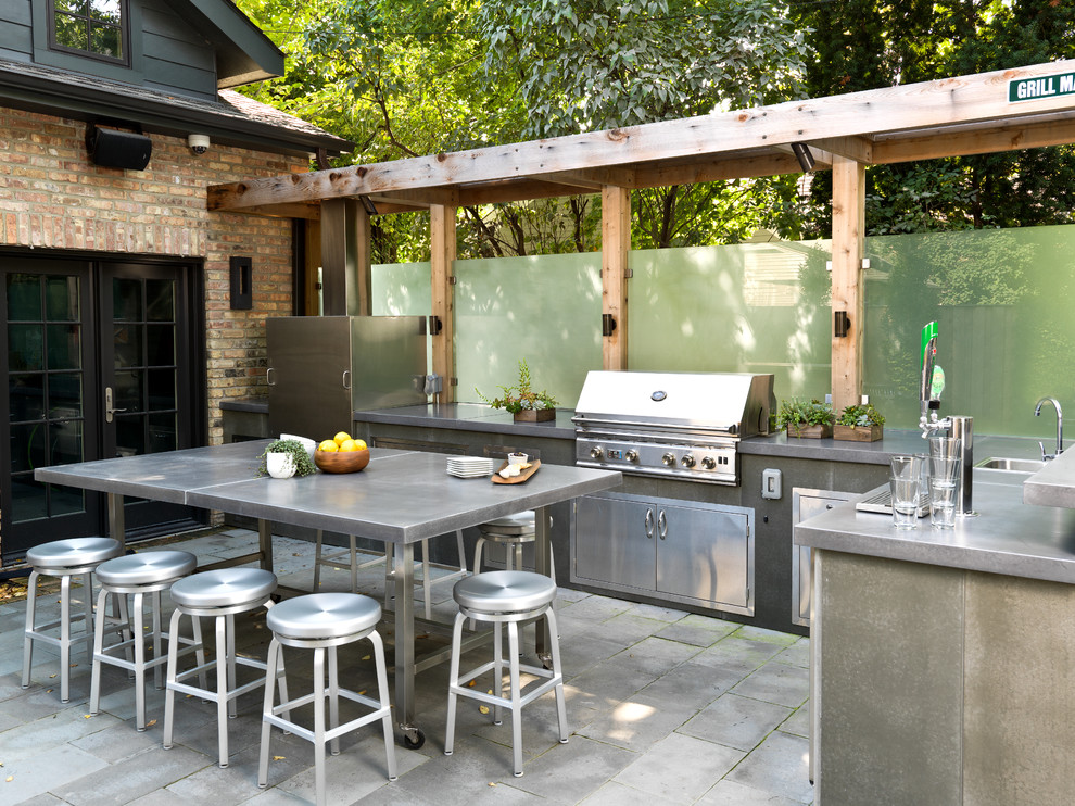 Example of a small trendy backyard stone patio design in Chicago