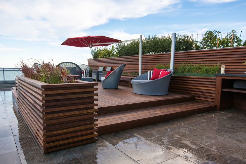 Photo of a contemporary roof garden in Toronto with decking.