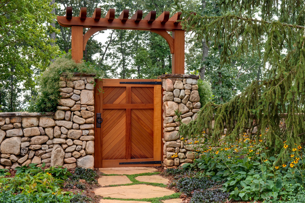 This is an example of a rustic garden in Atlanta with a garden path.