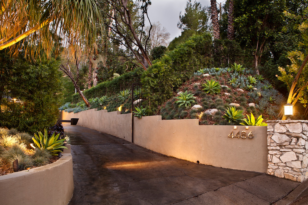 Design ideas for a mediterranean sloped garden in Los Angeles.