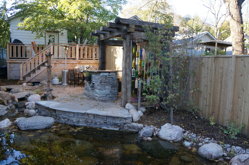 Coolest backyard ever Eclectic Landscape Toronto by Greg Hahn