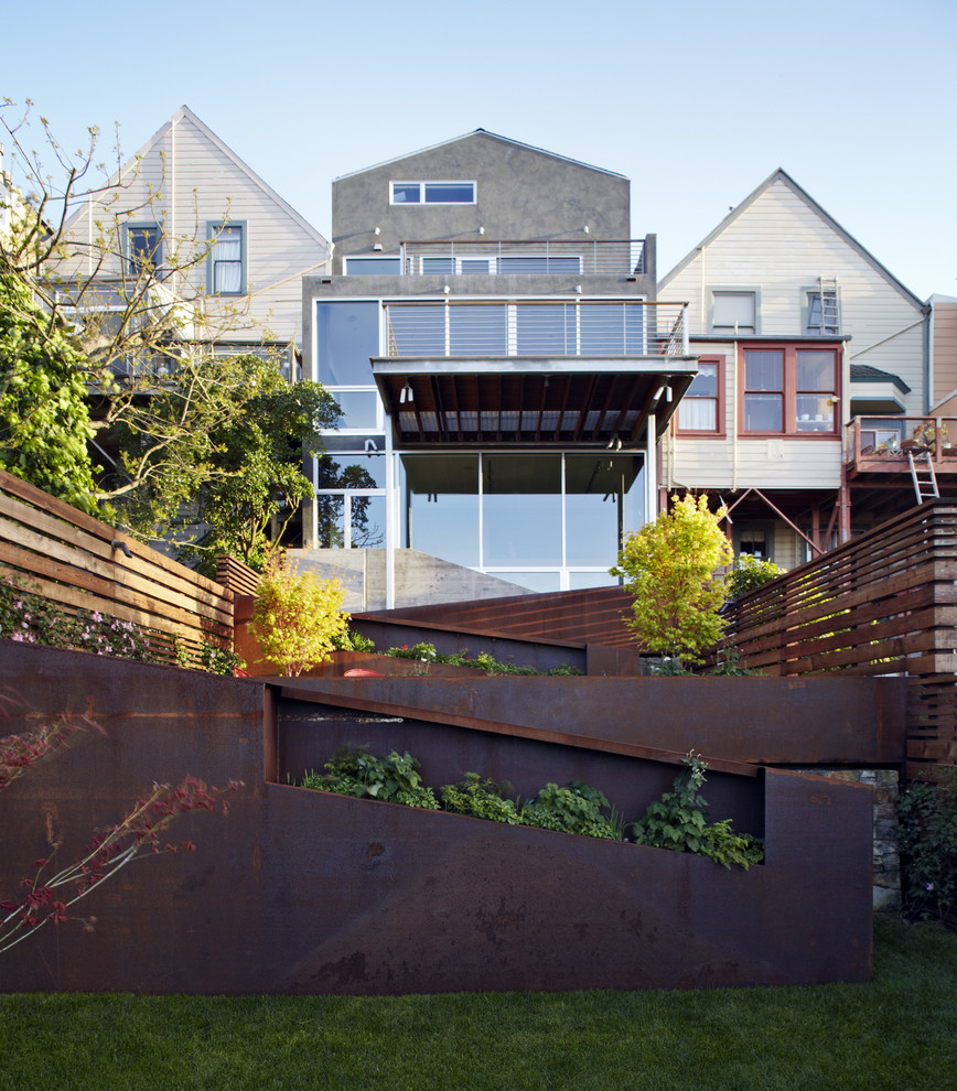 Medium sized modern back xeriscape partial sun garden in San Francisco.