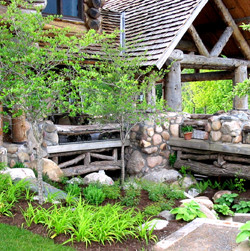 Idee per un ampio giardino xeriscape rustico esposto in pieno sole sul tetto in primavera con un ingresso o sentiero e pavimentazioni in pietra naturale