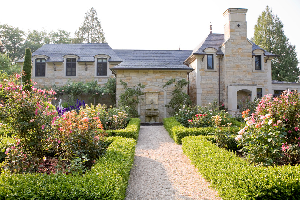 Inspiration for a large traditional gravel formal garden in Seattle.