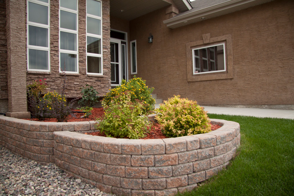 Design ideas for a traditional brick landscaping in Other.