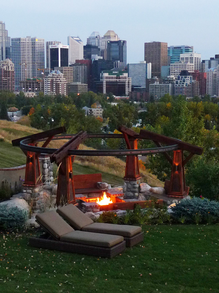 Photo of a craftsman landscaping in Calgary with a fire pit.