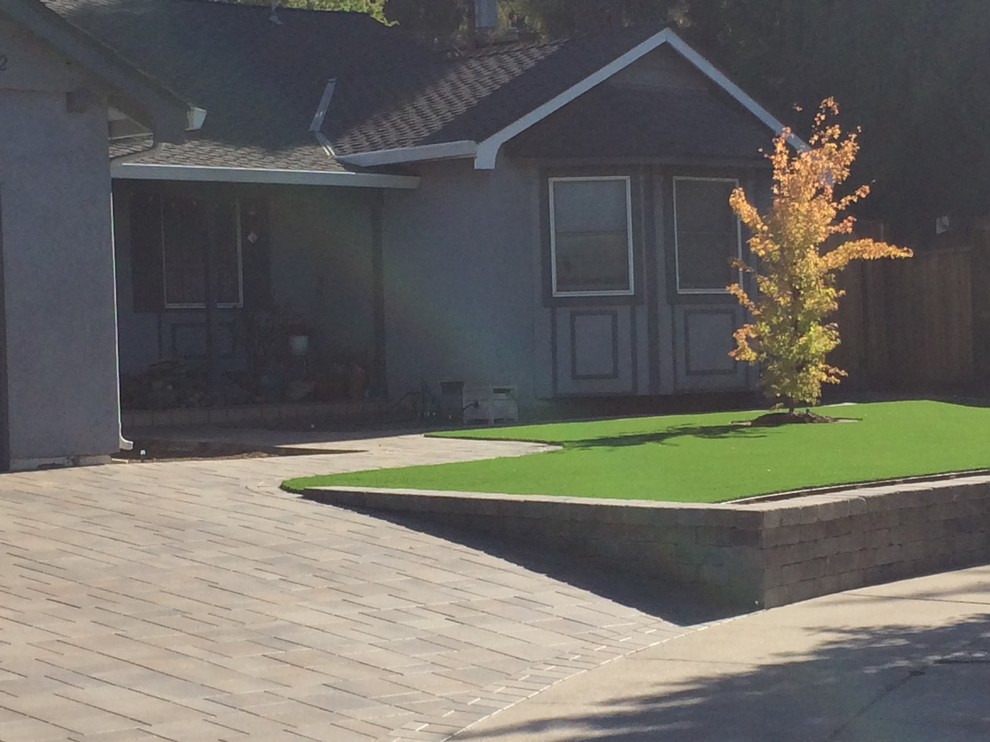 Design ideas for a medium sized classic front driveway full sun garden in San Francisco with concrete paving.