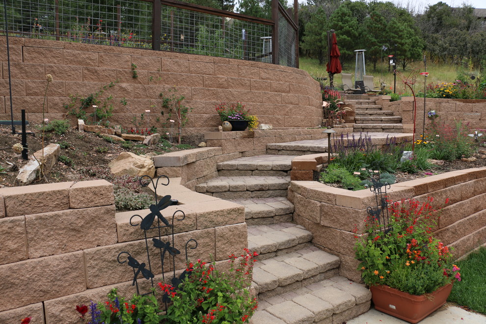 Inspiration for a large eclectic drought-tolerant and full sun concrete paver garden path in Denver.
