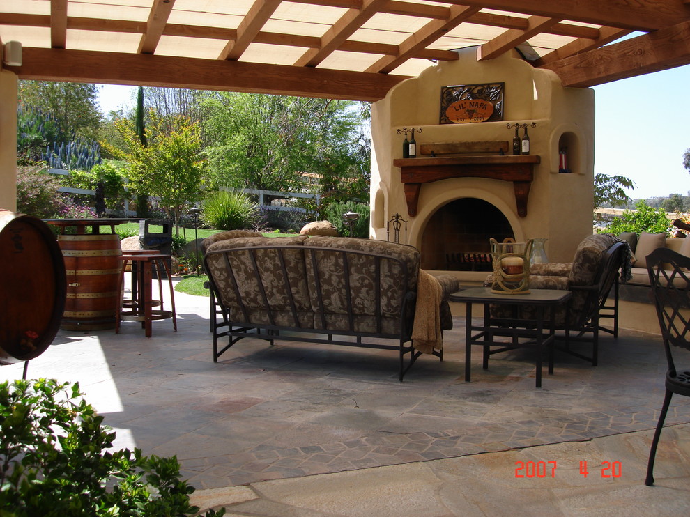 Design ideas for an expansive eclectic patio in San Diego.