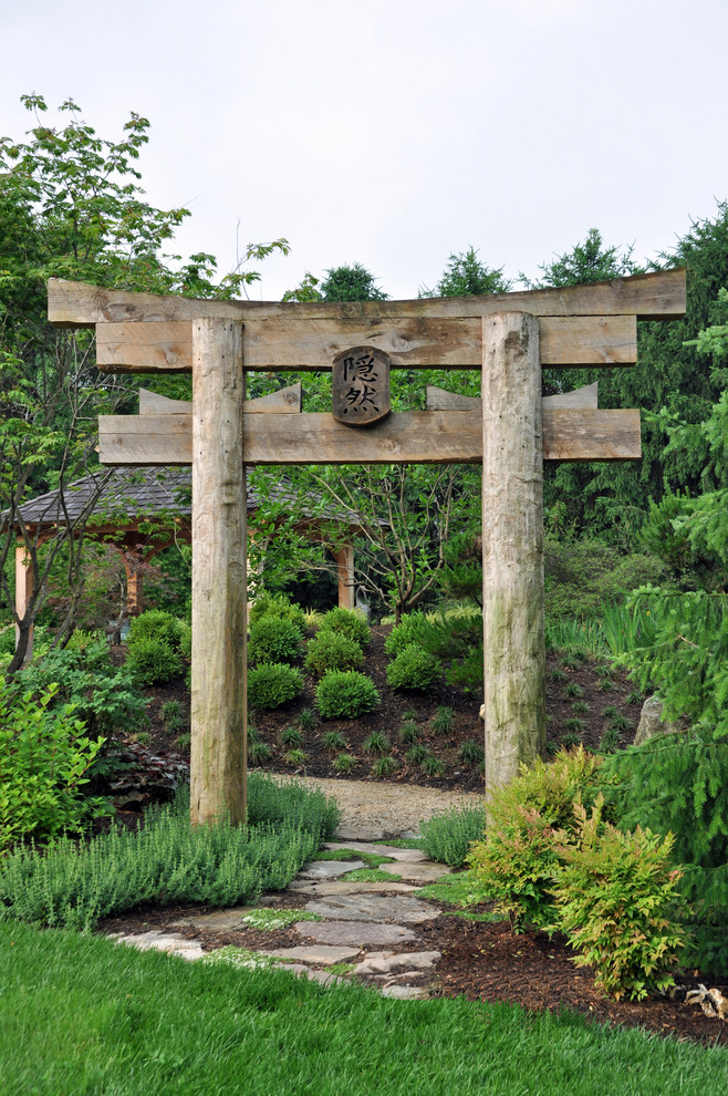 Design ideas for a world-inspired garden in Baltimore with a water feature.