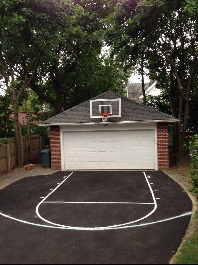 Inspiration for a mid-sized traditional partial sun side yard concrete paver outdoor sport court in New York.