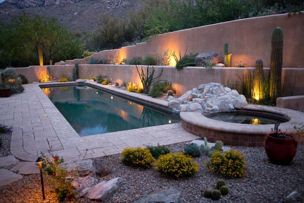 This is an example of a large southwestern drought-tolerant backyard landscaping in Phoenix.