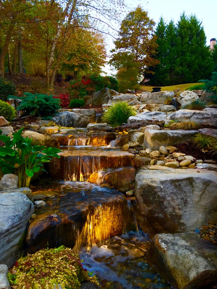 Inspiration for a large traditional backyard landscaping in Atlanta.