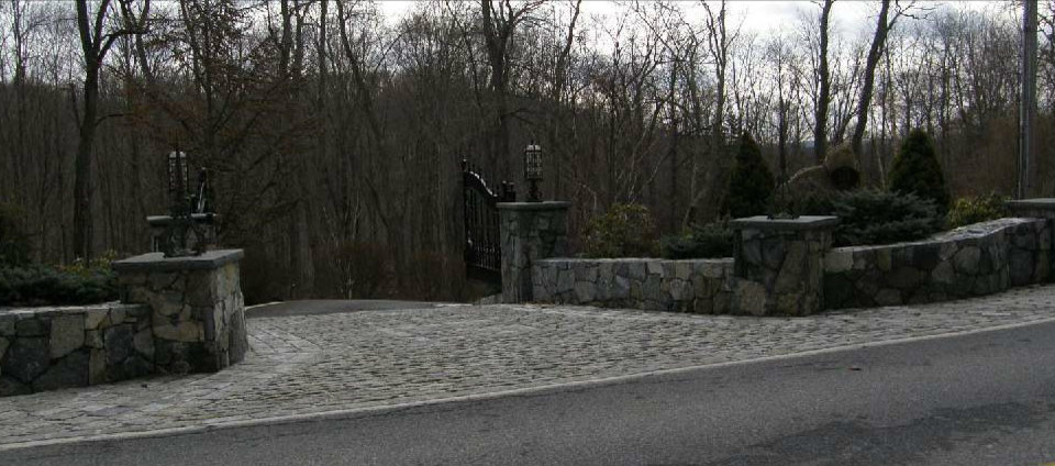 This is an example of a large traditional full sun stone driveway in New York.