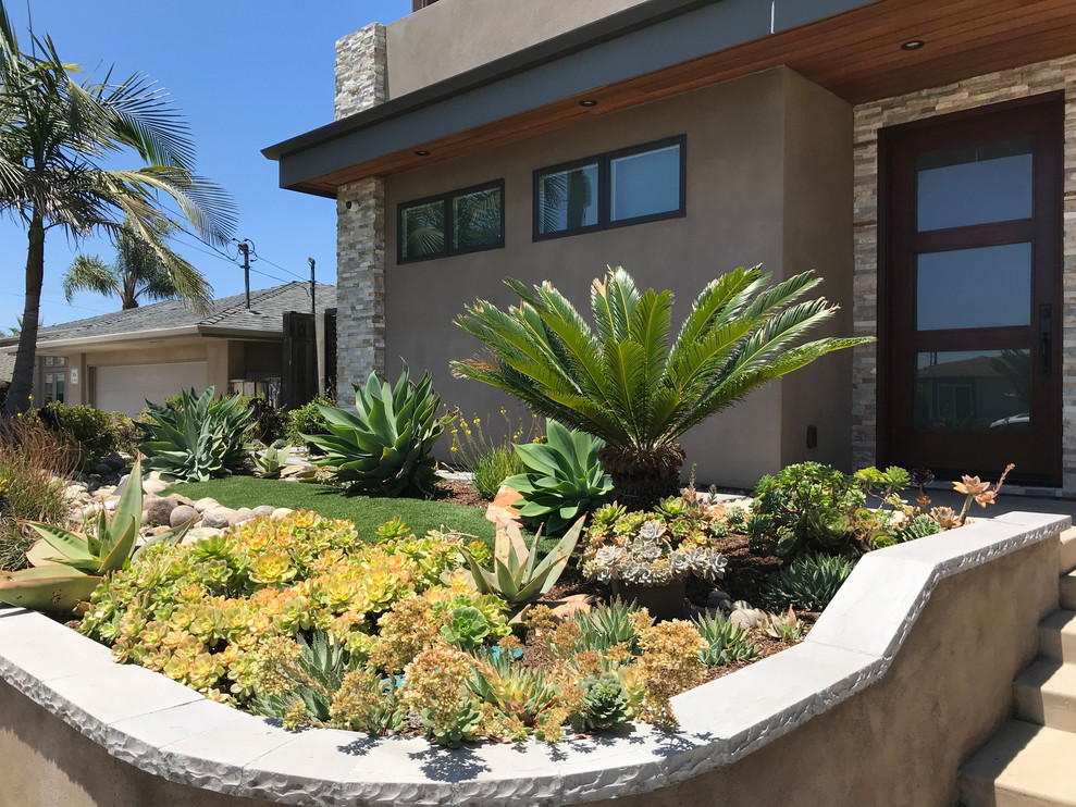 Inspiration for a large contemporary drought-tolerant and full sun backyard stone and wood fence garden path in San Diego for summer.