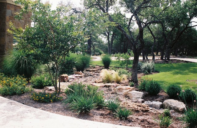 Dry Creek Beds used for drainage Rustic Garden Austin by